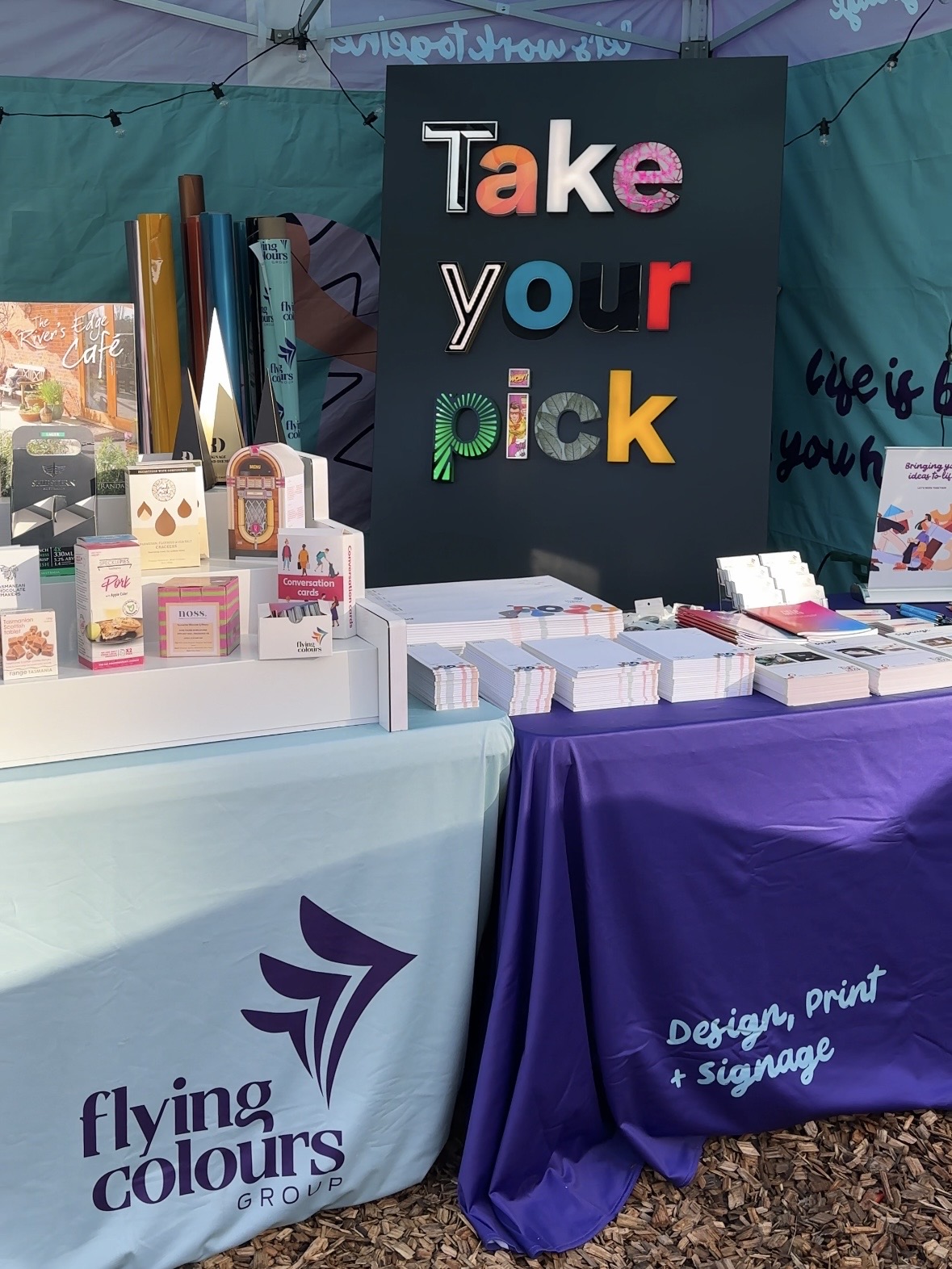 Flying Colours Group creative signage and print display at Agfest